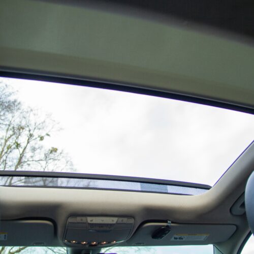 Sun roof of a Mercedes C-Class photographed from the rear seat.