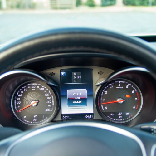 Steering wheel cluster of a Mercedes C-Class.